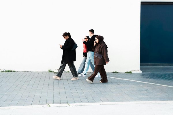 What impact does urbanization have on UK car ownership trends?